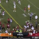 Arkansas fans storm the field after upsetting No. 4 Tennessee.